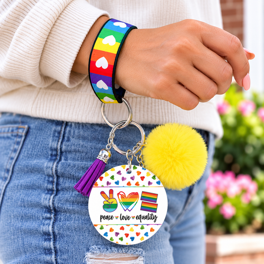 Love in Every Color wristlet worn while holding a tumbler