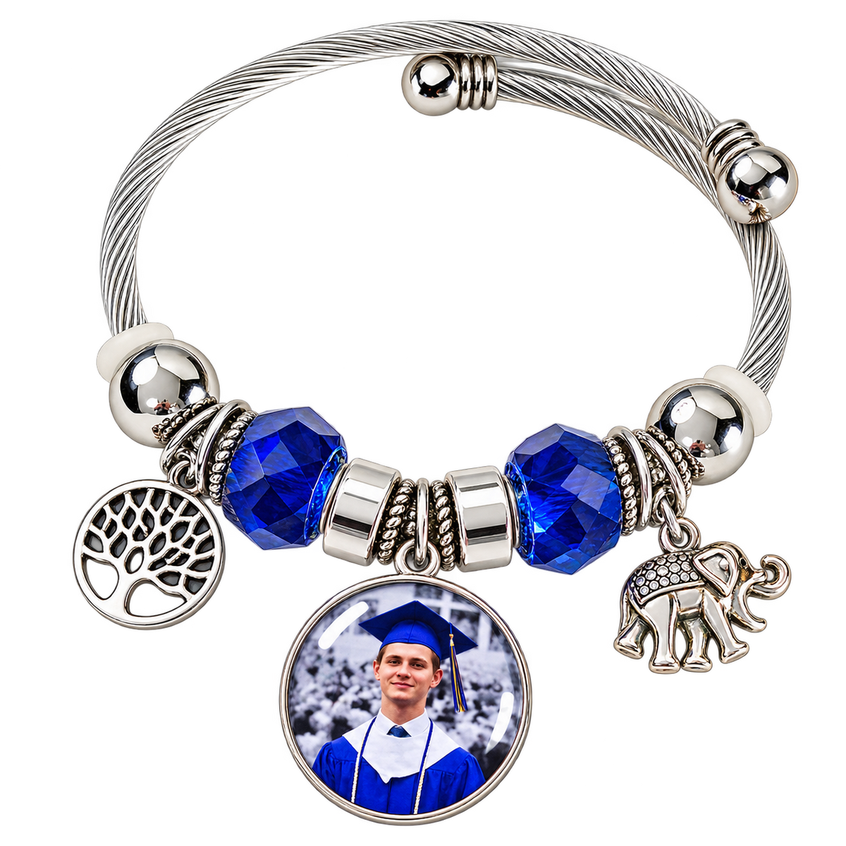 Front view of Rooted in Memories photo bracelet showing a graduation portrait, blue faceted beads, and silver-tone tree of life and elephant charms.