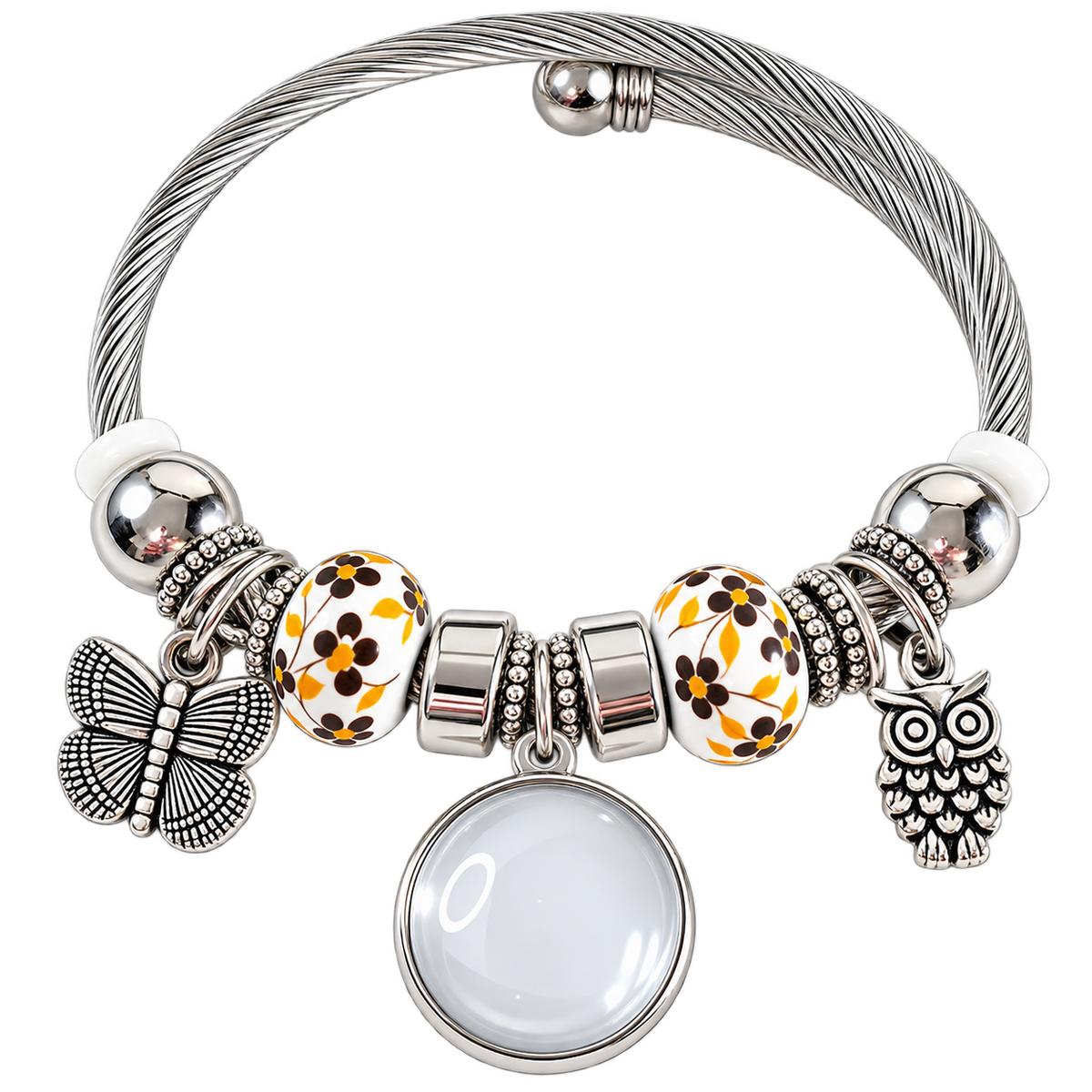 A Memory to Wear bracelet with interchangeable snap button photo fixture, showing the photo charm’s front, back, and attachment mechanism.