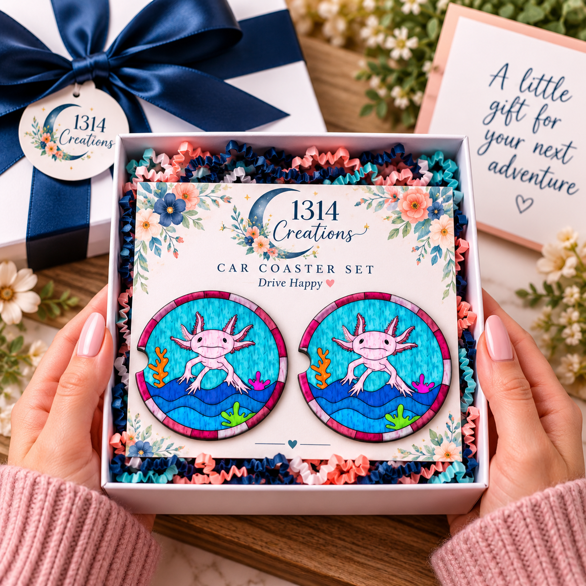 A Lotl Underwater Magic axolotl car coaster set presented as a gift