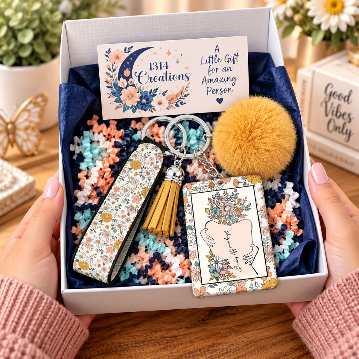 Bans Off Our Bodies floral wristlet keychain arranged in a gift box