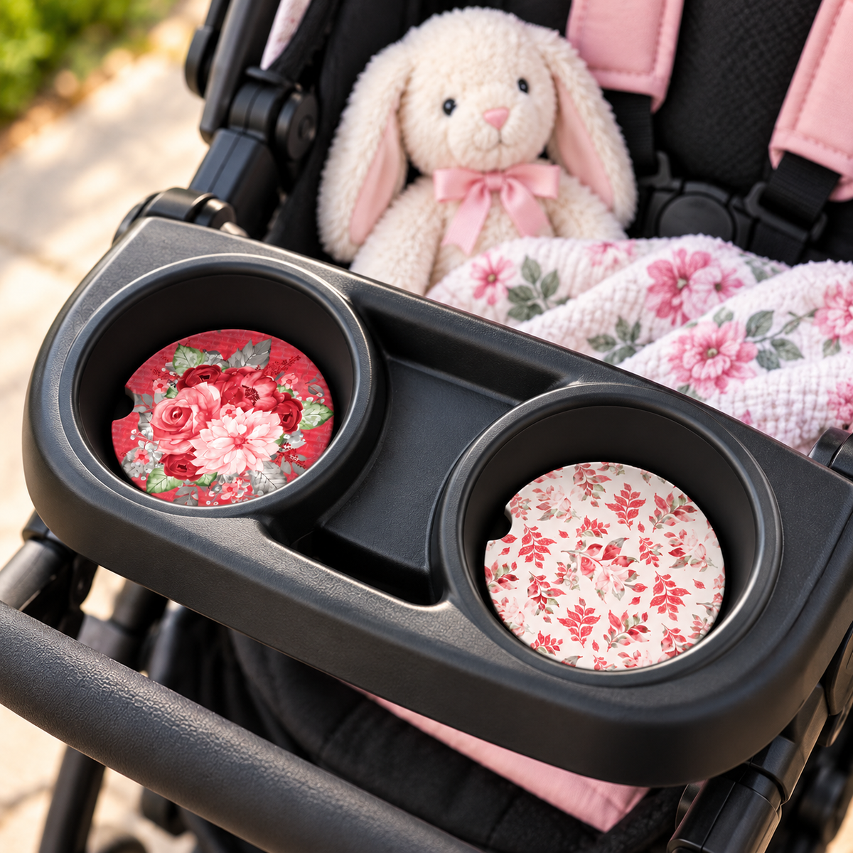 Crimson Petals red and blush floral coasters displayed in two cup holders on a tray