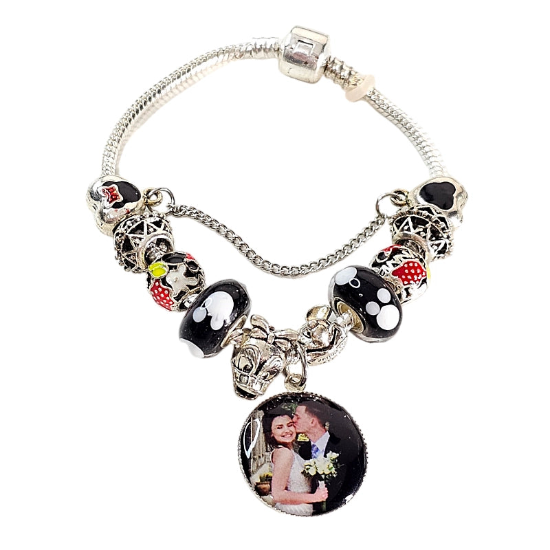 Enchanted Memories personalized photo bracelet with black, white, and red mouse-themed beads, silver-tone accents, and a round couple photo charm.