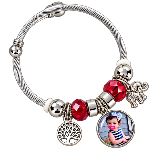 Forever in My Heart personalized photo bracelet with a silver-tone cable band, red faceted beads, tree of life charm, and elephant charm.