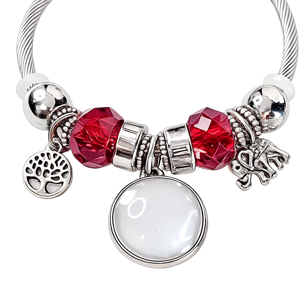 Close-up of Forever in My Heart bracelet with a blank round photo setting, red faceted beads, and silver-tone tree of life and elephant charms.