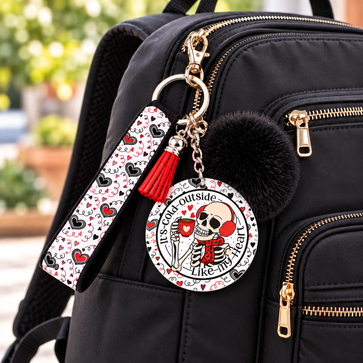 Frosted Soul wristlet keychain hanging from a backpack