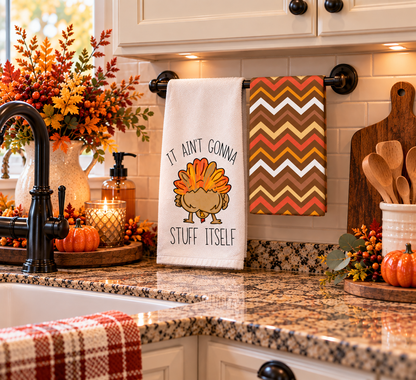 Thanksgiving turkey towel set hanging in a fall kitchen
