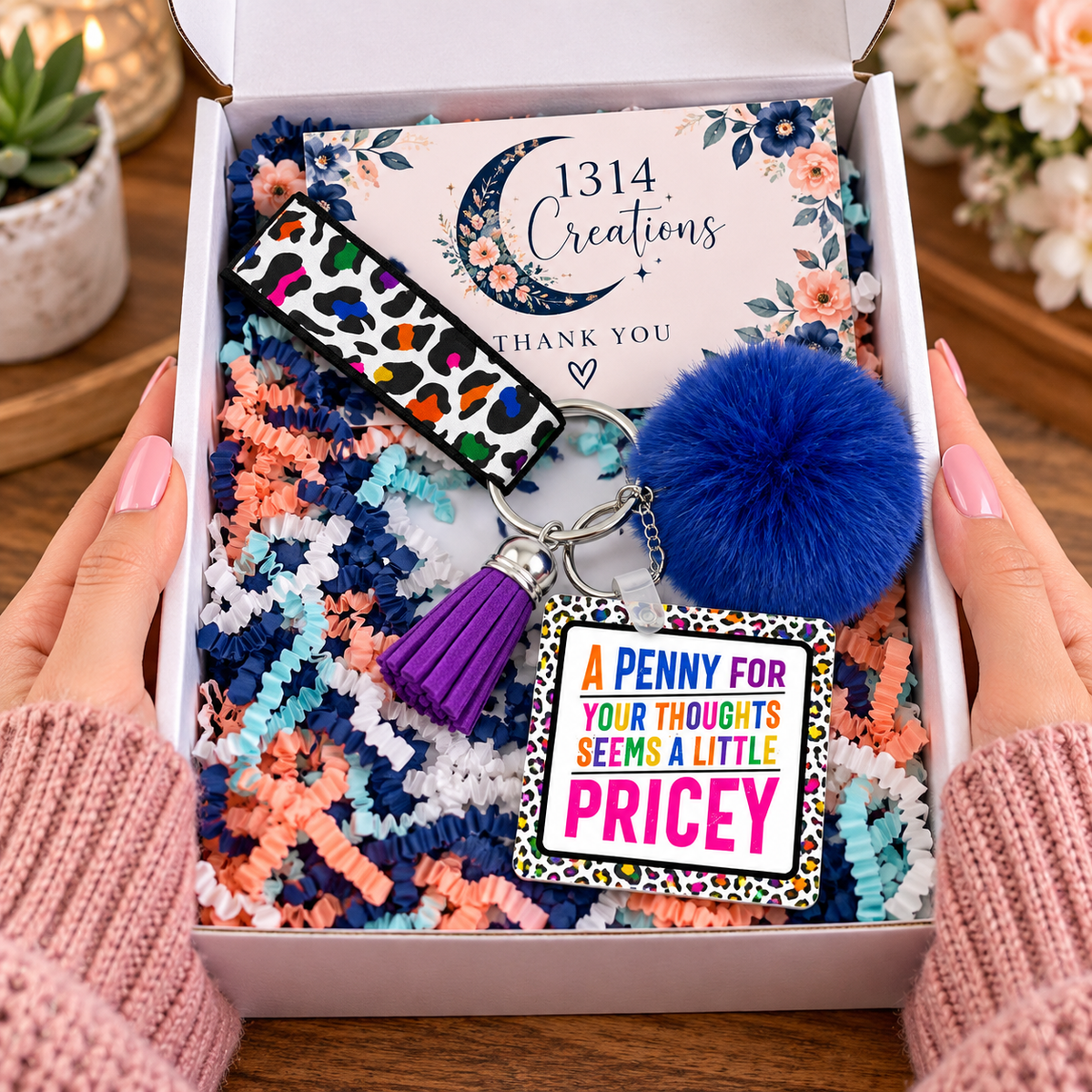Keep the Change wristlet keychain arranged in a gift box