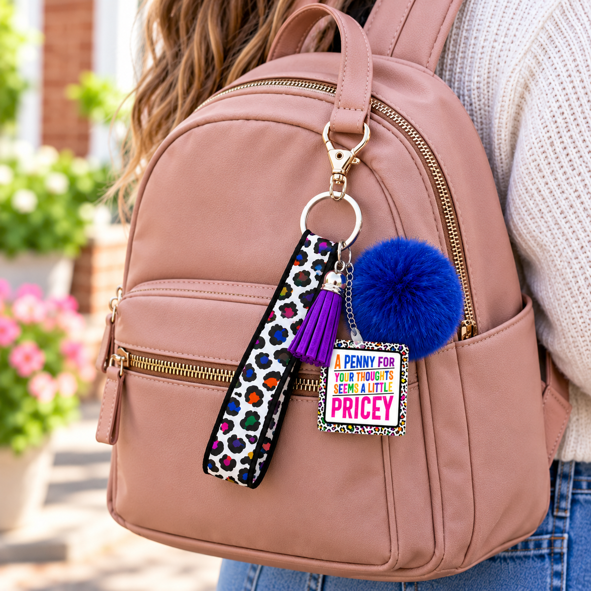 Keep the Change wristlet keychain hanging from a backpack