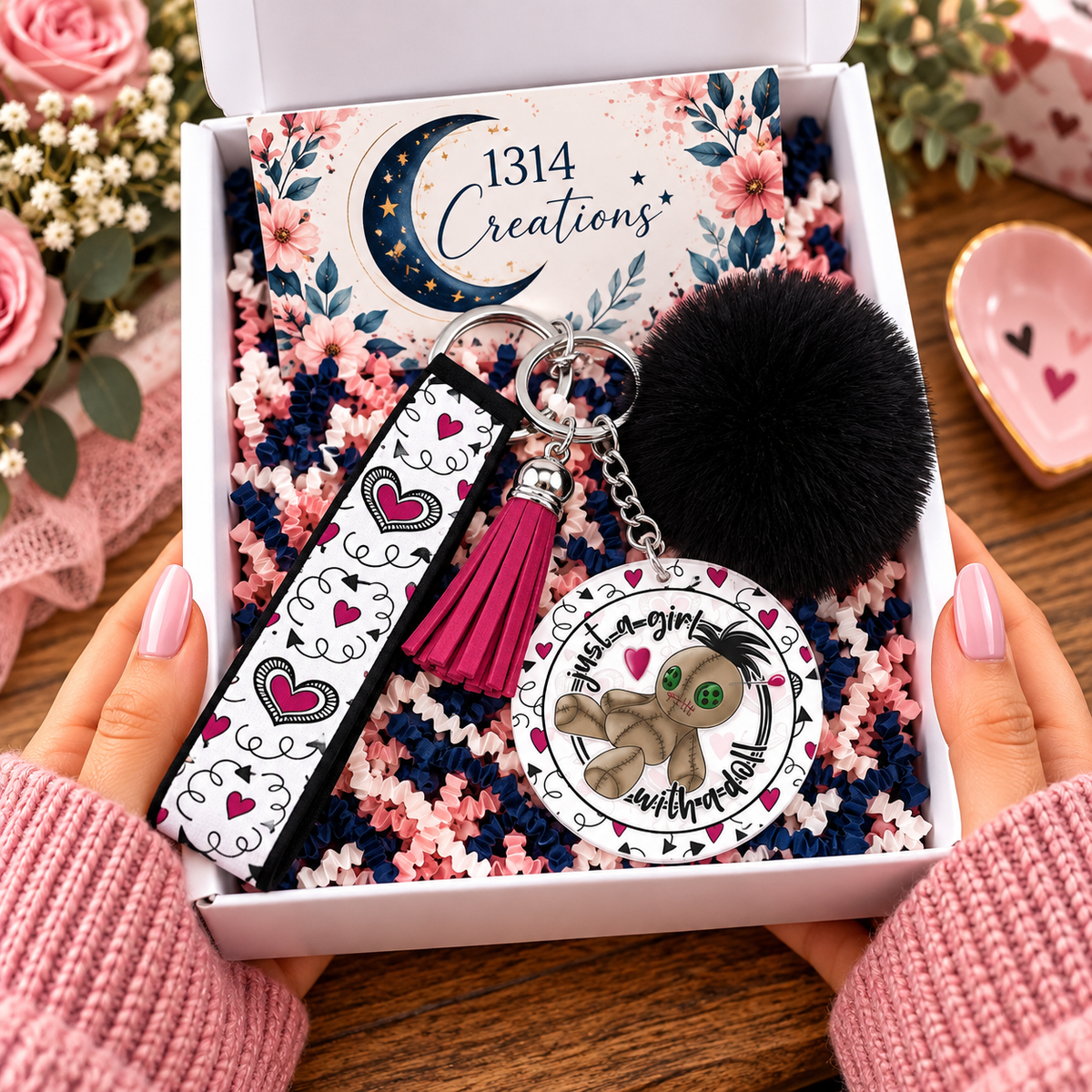 Love Me to Pieces wristlet keychain arranged in a gift box