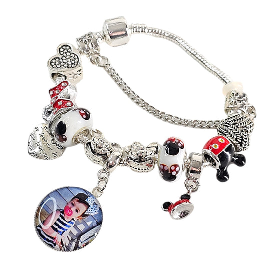 Magical Memories personalized photo bracelet with red, black, and white mouse-themed beads, silver-tone charms, and a round child photo charm.