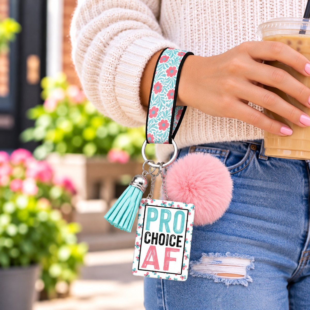My Choice in Full Bloom wristlet worn while holding a tumbler
