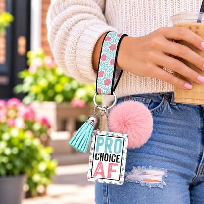 My Choice in Full Bloom wristlet worn while holding a tumbler