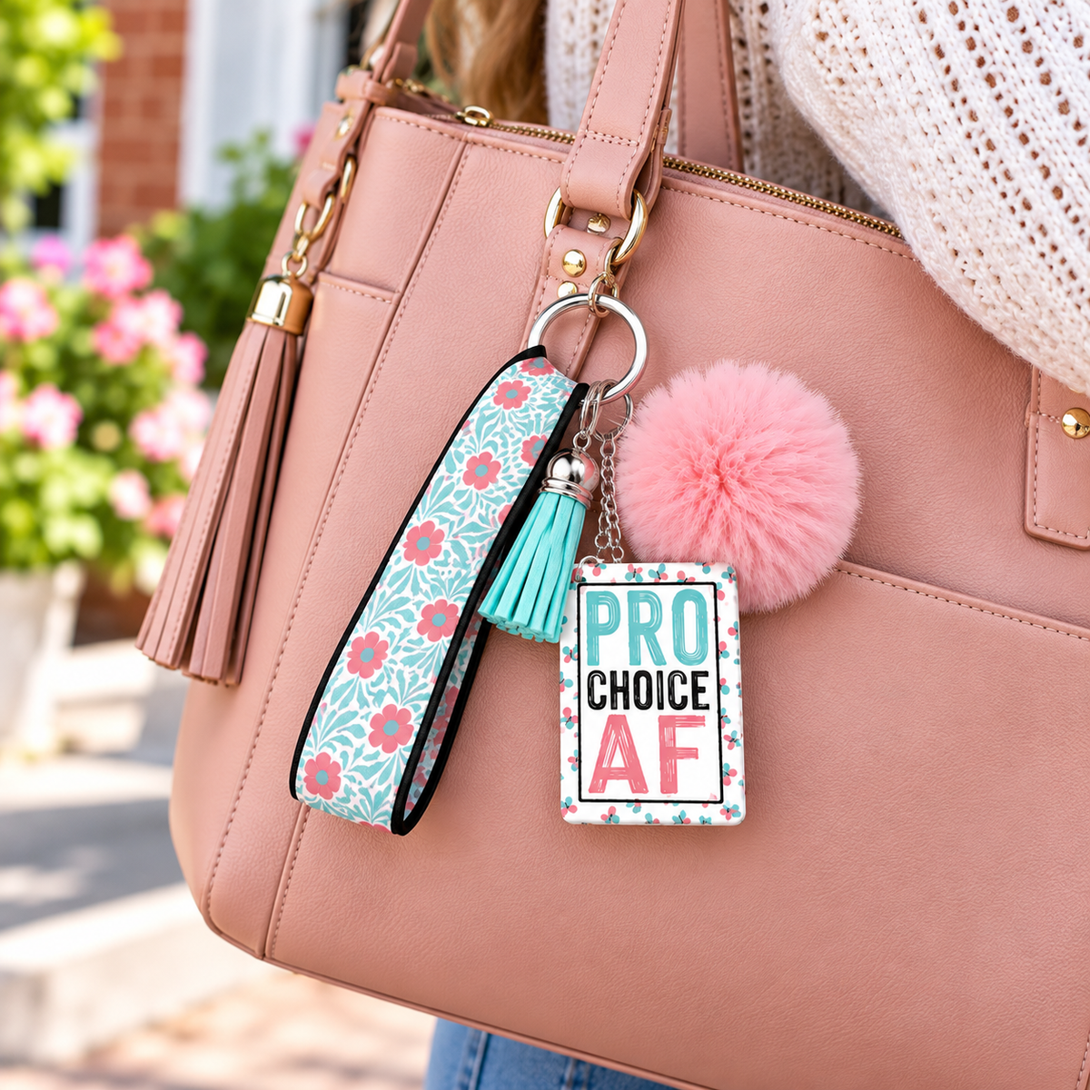 My Choice in Full Bloom wristlet keychain hanging from a purse