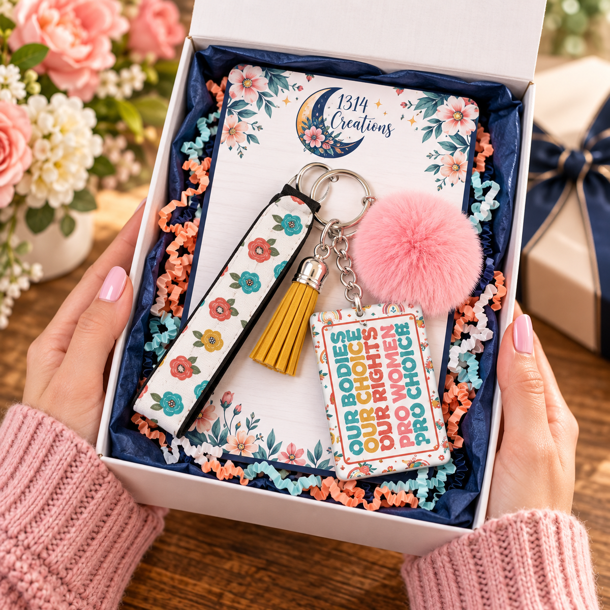 Petals Power and Choice wristlet keychain arranged in a gift box