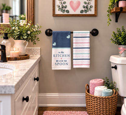 Spoons Sweets and Little Treats hand towel set hanging beside a bathroom sink