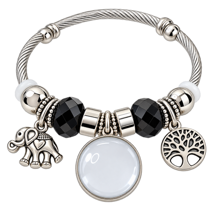 Black-and-silver bracelet with a blank round photo charm, elephant and Tree of Life charms