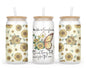 A 16oz frosted glass tumbler featuring a whimsical design of a girl with sunflower wings on one side and butterfly wings on the other, surrounded by sunflowers, with the words 'be like a Sunflower; stand tall and follow the sun