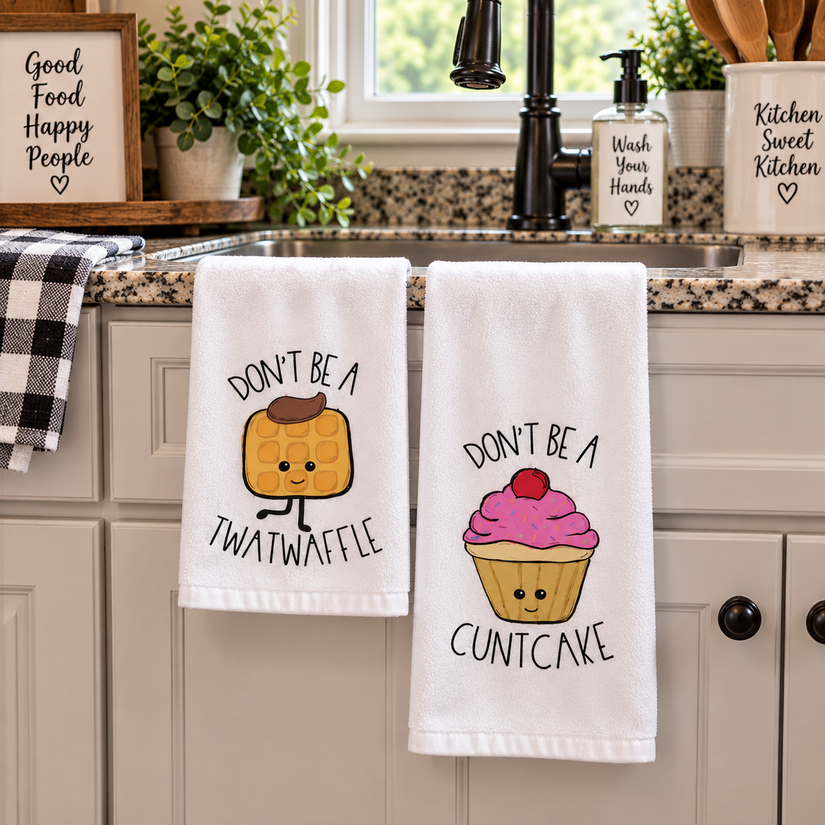 Syrup Sprinkles & Sass two-piece hand towel set featuring cowboy waffle and pink cupcake with adult-humor sayings, hanging below kitchen sink