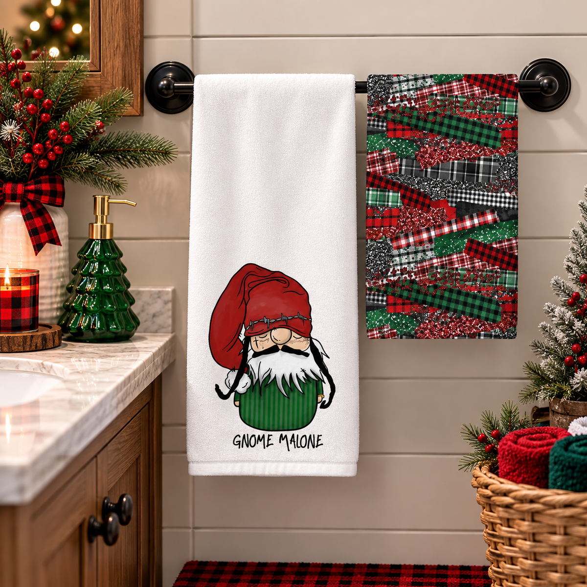 Gnome Malone Christmas towel set beside a kitchen sink