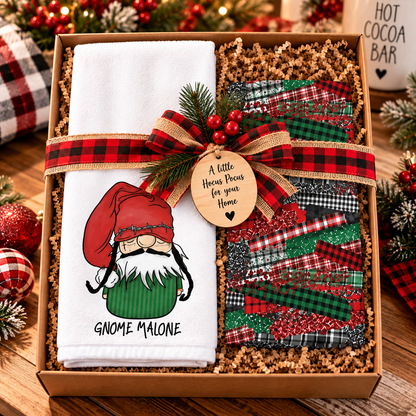 Gnome Malone Christmas towel set arranged in a gift basket