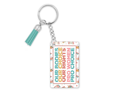 Petals Power and Choice printed keychain and tassel displayed without the wristlet