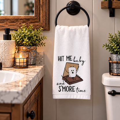 S'mores hand towel hanging beside a kitchen sink