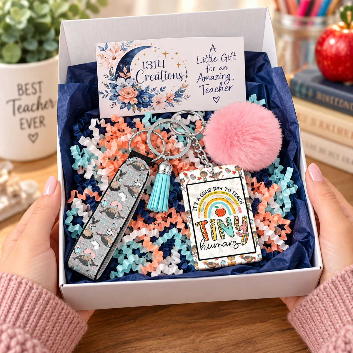 Teacher wristlet keychain arranged in a gift box